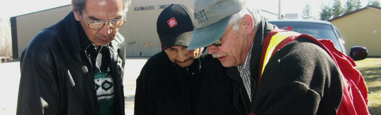 A forester consulting with Indigenous partners