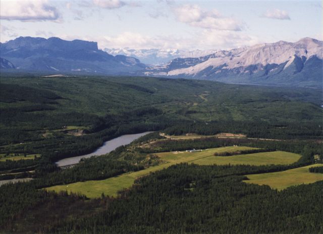 aerial photo of cutblock by lake